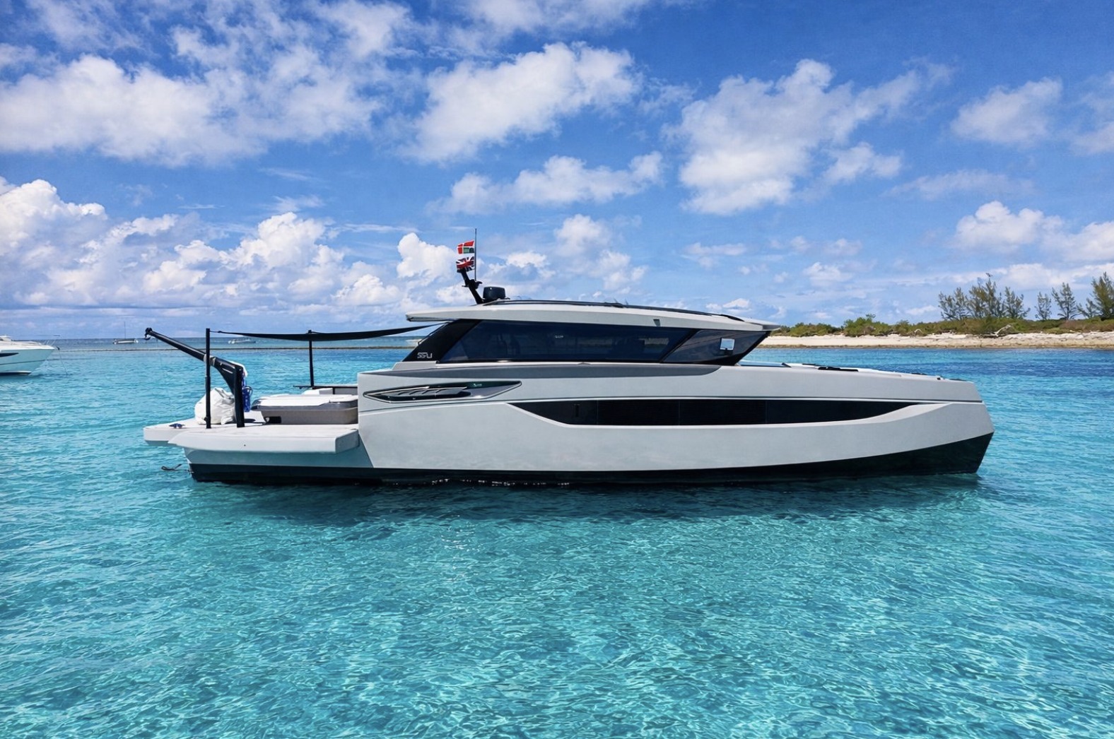 Sunreef 55 Ultima side profile in shallow turquoise water