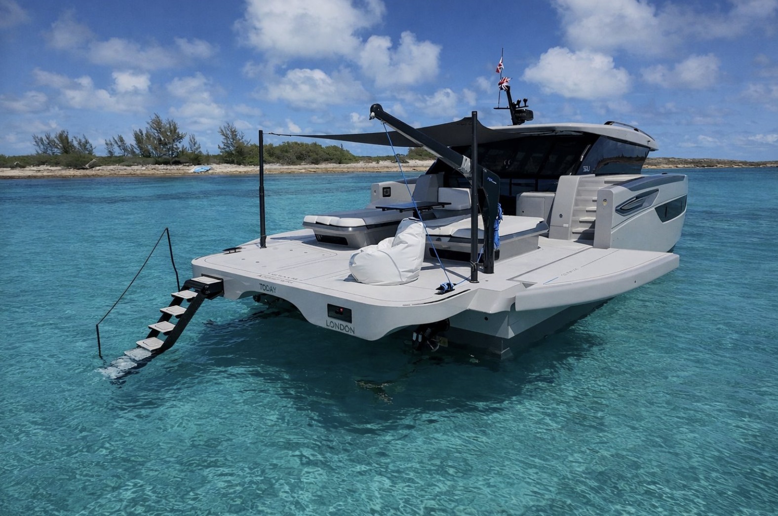 Sunreef 55 Ultima aft quarter view with swim stair deployed